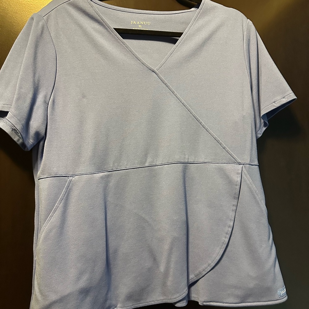 XL Jaanuu empire waist ceil blue scrub top.